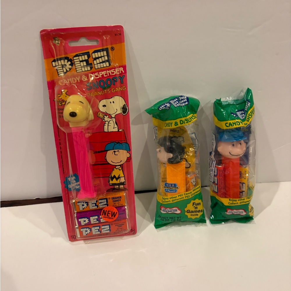 Three New In Box Peanuts Pez Dispensers